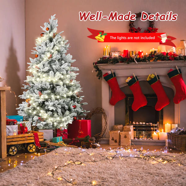 6.9' Artificial Christmas Tree with 1150 Branch Tips, Pine Cones and Red Berries, Snow Flocked, Green | karmasfar.com
